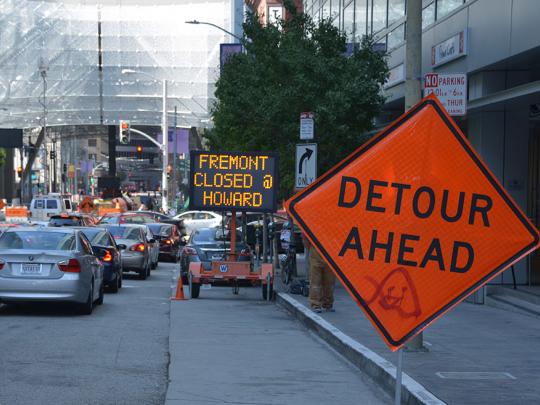 Detour Sign on a busy street